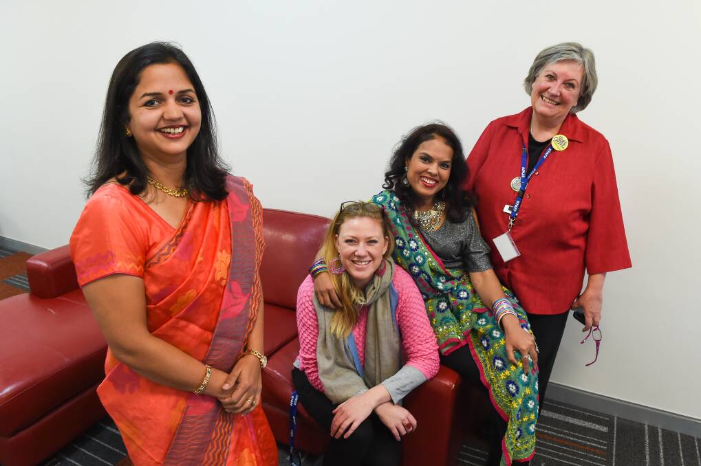 GOOD RESPONSE: AWECC community advocacy officer Lucie Wallis with Priyanka Mishra, Minakshi Shrimali and Tricia Hazeleger earlier this year.