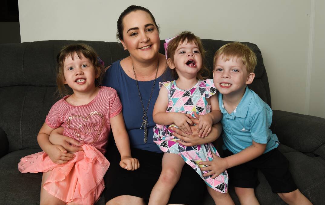 FAMILY SMILES: Fundraiser co-organiser Ashlea Howells, of Albury, with her three children Milly, 4, Olivia, 2, and Leo, 6. Picture: MARK JESSER