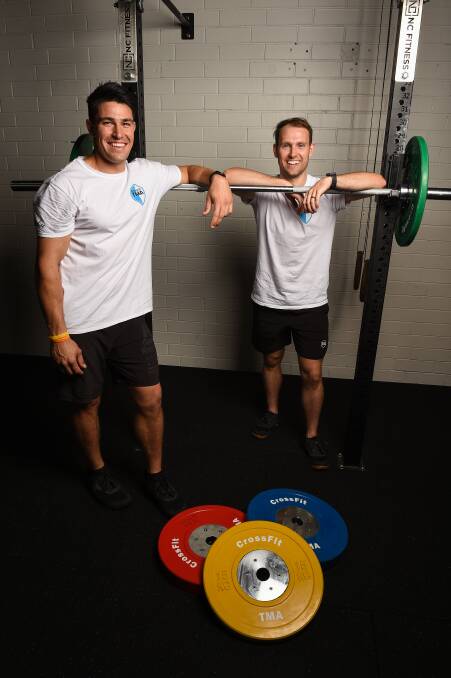 OPEN FOR BUSINESS: CrossFit TMA owners Zak Rogers and Scott Foley are now offering classes out of their new fitness centre in Church Street, Wodonga. Picture: MARK JESSER