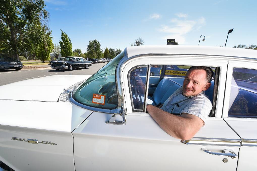 HIT THE ROAD: Anthony McKenzie, of Gerogery, waits in his Chevy as the All Welcome Cruise heads out of Wodonga. Picture: MARK JESSER