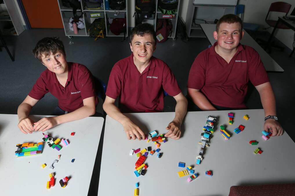 BUILDING BLOCKS: Belvoir Special School students Jesse Torpy, 13, Zach Robinson, 14, and Jordon Condron, 13, create with Lego, a new Doll, Bear and Hobby Show competition category.