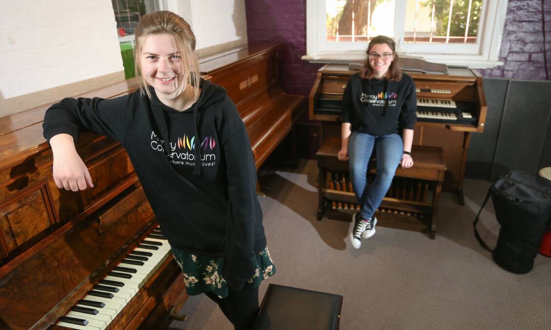 NEXT GENERATION: Murray Conservatorium teachers Ruth Little and Katja Jorgensen are among staff and students who will use the three keyboard instruments given by longtime teacher Elaine Buchhorn. Picture: JAMES WILTSHIRE
