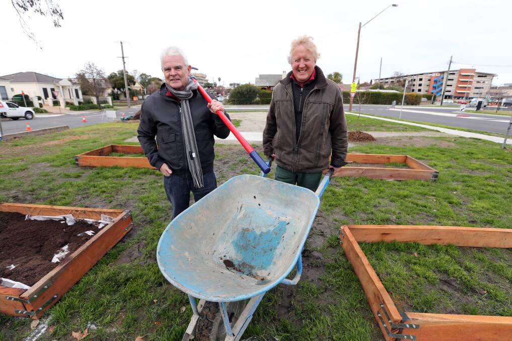 FLASHBACK:  Bungam Community Garden was a much sparser place when it opened last July. Residents Frank Dunk and Peter Atkins have been keen volunteers throughout the Albury project.
