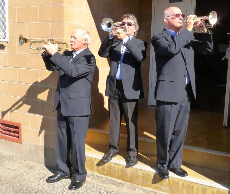 BUGLE BOYS: Albury City Band buglers Terrance Cockayne, Toli Kolisnyk and Anthony Foley practise the Last Post ahead of Anzac Day next week. Picture: JODIE WORRALL