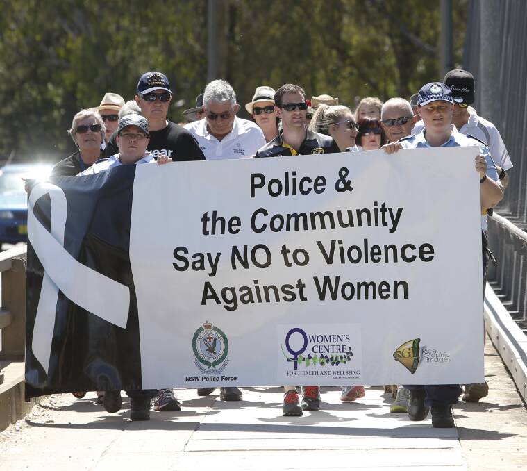 BRIDGE CROSS: The Albury contingent of the joint White Ribbon Day march. Picture: ELENOR TEDENBORG