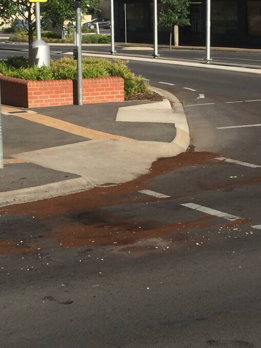 AFTERMATH: The crash scene on the corner of Dean and Young Streets, Albury, on Wednesday morning. Picture: JANET HOWIE