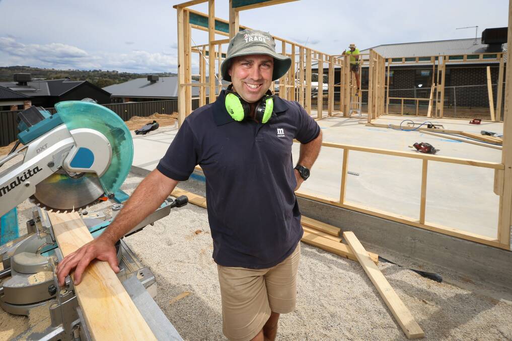 LIFESTYLE CHOICE: Metricon Homes site manager Joel Shepherd at work in Leneva. The company's regional Victorian sales in 2020 rose by about 35 per cent. Picture: JAMES WILTSHIRE