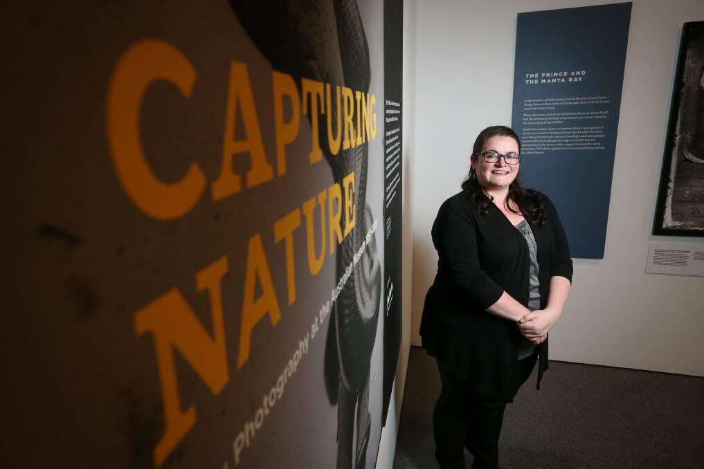 CAPTURING NATURE: Albury Library Museum plans to launch a virtual tour of its latest exhibition. Staff member Kate Eastick stands among the physical display. Picture: JAMES WILTSHIRE