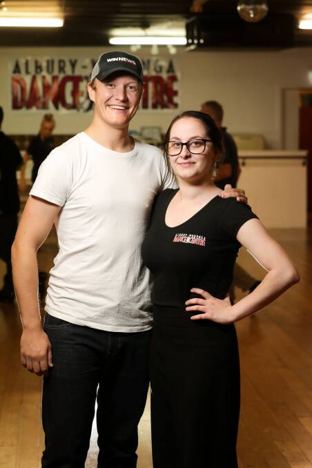 LEARNING LATIN: Television journalist Mark Blackman and his teacher Megan Reid Tonkin will take part in Stars of the Border Dance for Cancer. Picture: JAMES WILTSHIRE