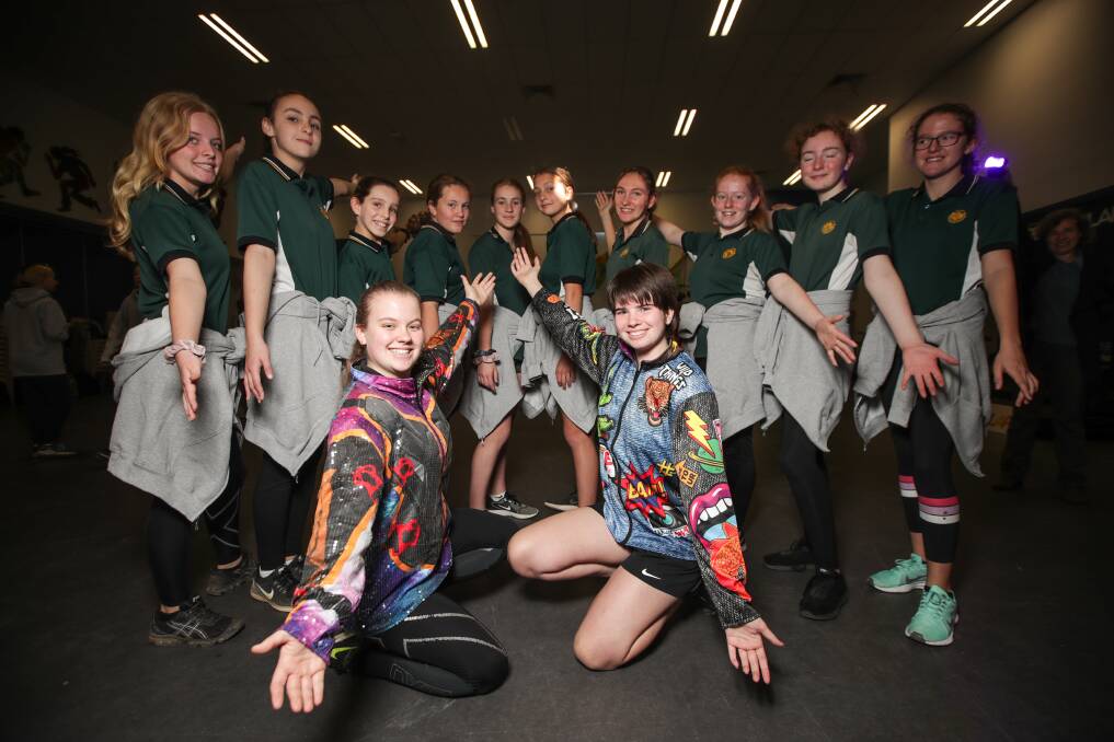 EXCITED: Amy Arnold, 16, Chelsea Weller, 15, and their fellow Rutherglen High School students can't wait for next month's Victorian State Schools Spectacular. Picture: JAMES WILTSHIRE