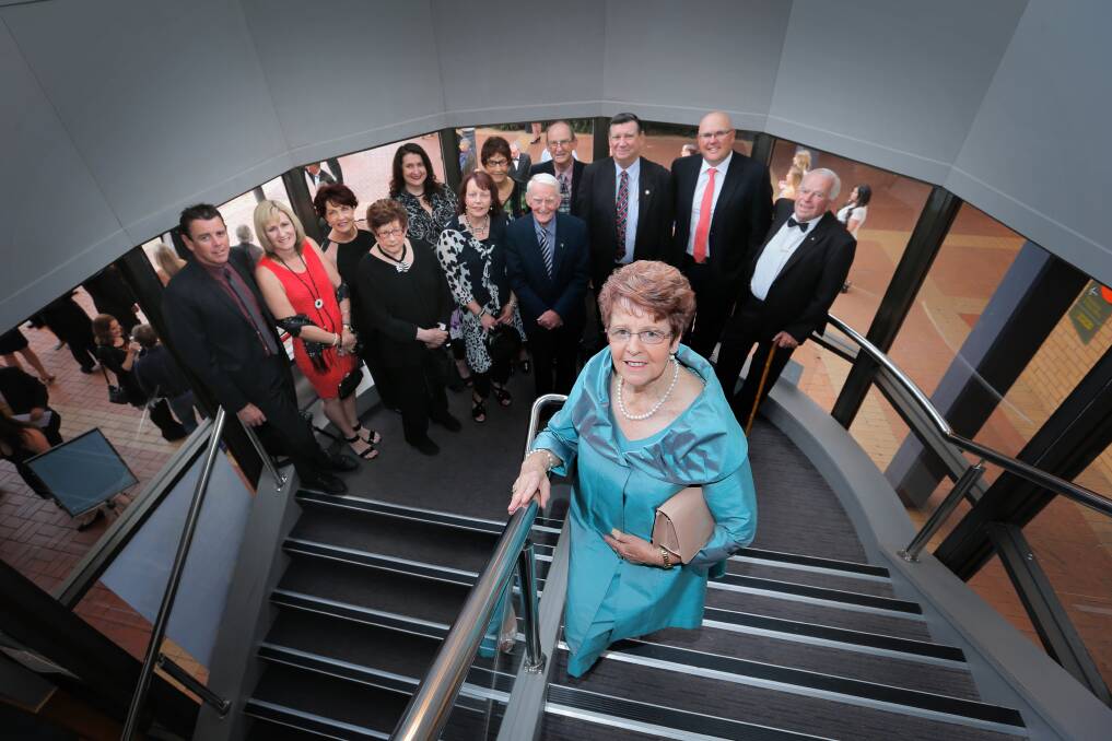 RECOGNITION: Rosalie Martin is pictured with family and friends after being named in the Albury-Wodonga Chamber Business Hall of Fame in 2014. Picture: TARA GOONAN