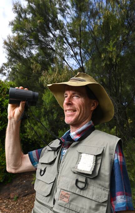 SURVEYING SKIES: Southern NSW woodland bird project officer BirdLife Australia Ben Humphries encourages people to contribute to this week's Aussie Backyard Bird Count. Picture: MARK JESSER