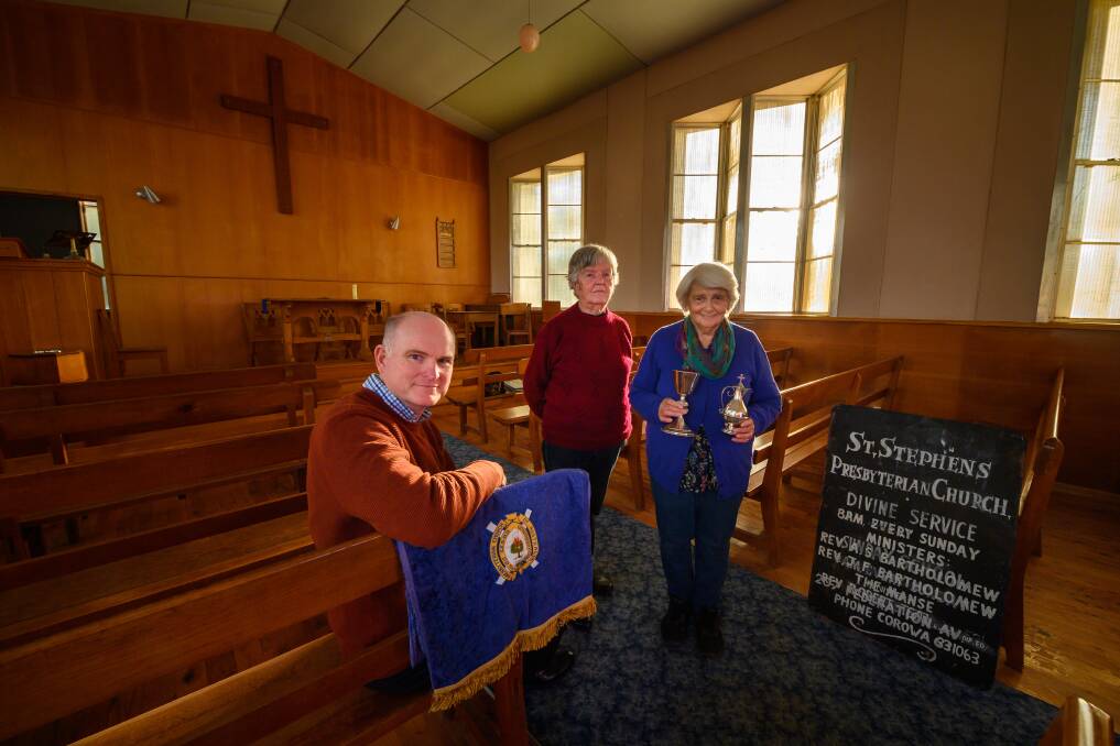 SERVICE CONCLUDES: For decades, St Stephen's Presbyterian Church, Balldale, has been a place of worship for its rural community. Now Reverend Richard Keith, Gwen Mills and Cath Wilson prepare for its sale. Picture: MARK JESSER