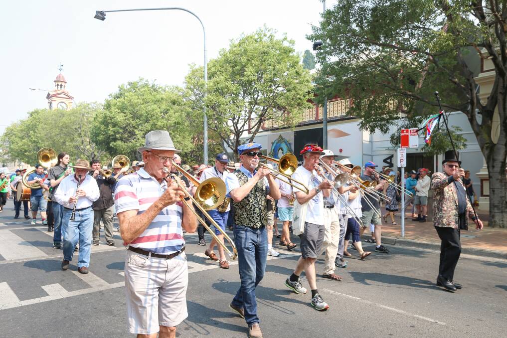 STREET MARCH: David O'Sullivan leads the Australian Jazz Convention parade down Dean Street, Albury, on Friday. Picture: JAMES WILTSHIRE