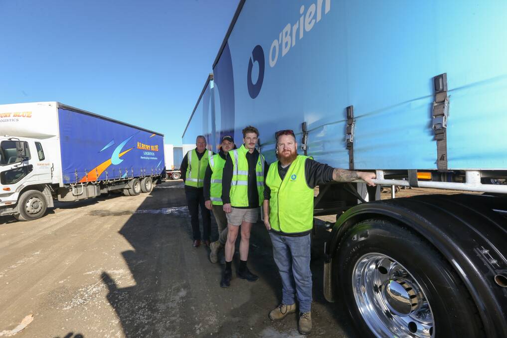KEEP ON TRUCKING: O'Brien Transport human resources manager Rod McIntosh with program participants Jackson Scholz, Riley Bice and Luke Howson. Picture: TARA TREWHELLA