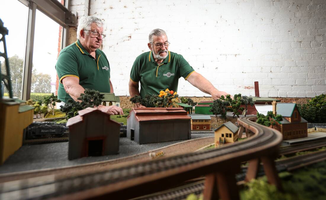 KEEN INTEREST: Brothers Neville and Keith Grigsby, the secretary and president respectively of Chiltern Railroaders and Modellers, appreciate the way people have embraced their activities at the Goods Shed in Wills Street. Picture: JAMES WILTSHIRE