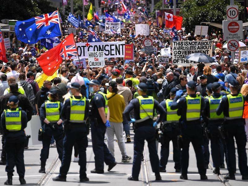 CITY CENTRE: Thousands of people protest in Melbourne against government COVID-19 measures.