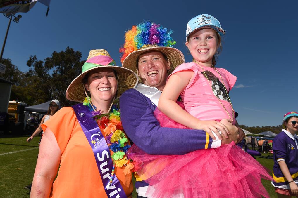 CAUSE FOR CELEBRATION: Rachel, Tony and Skyla Saunders, of Baranduda, were among 2577 participants in this year's Border Relay For Life at Wodonga's Birallee Park.