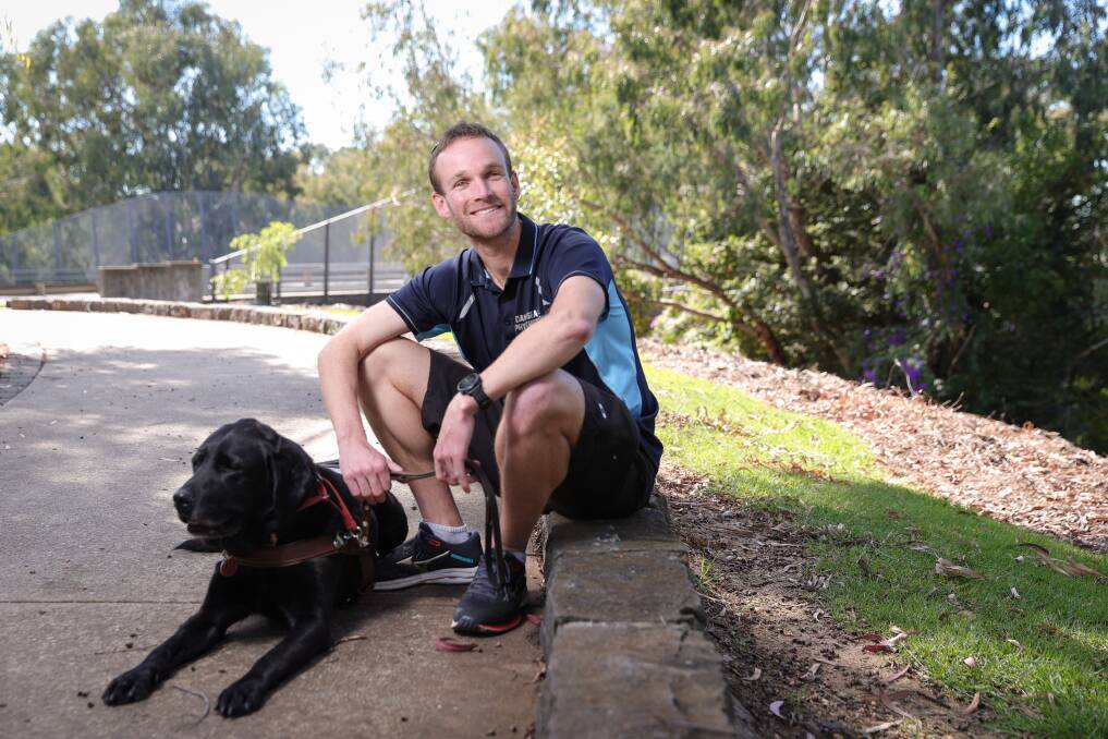 VOTER SNAPSHOT: Albury's Daniel Searle, pictured with his guide dog Frodo, hasn't yet felt inspired by any election announcements. Picture: JAMES WILTSHIRE