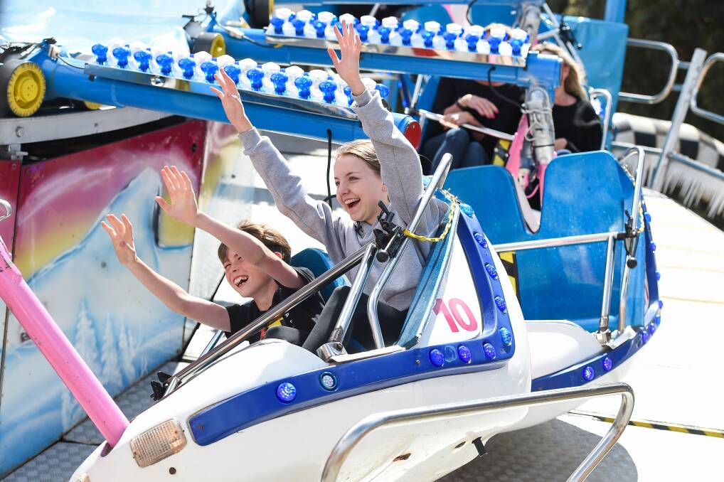 THRILLS GALORE: Cooper Webster, 10, and Lilaha Ornsby, 14, of Mulwala, test nerves on the show rides. Picture: MARK JESSER