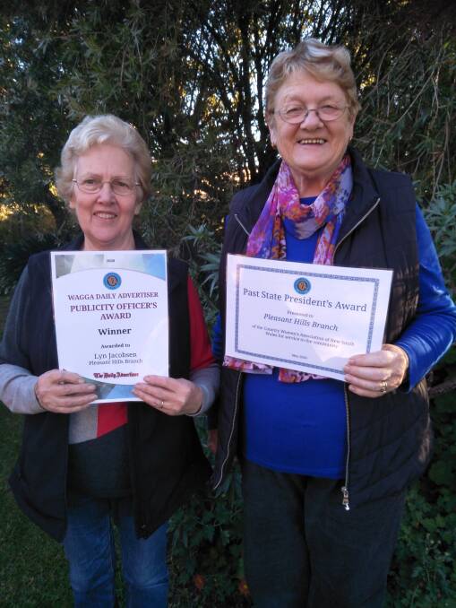 CWA RECOGNITION: Pleasant Hills branch president and publicity officer Lyn Jacobsen and treasurer Beverley Frohling display the two 2020 NSW conference awards.