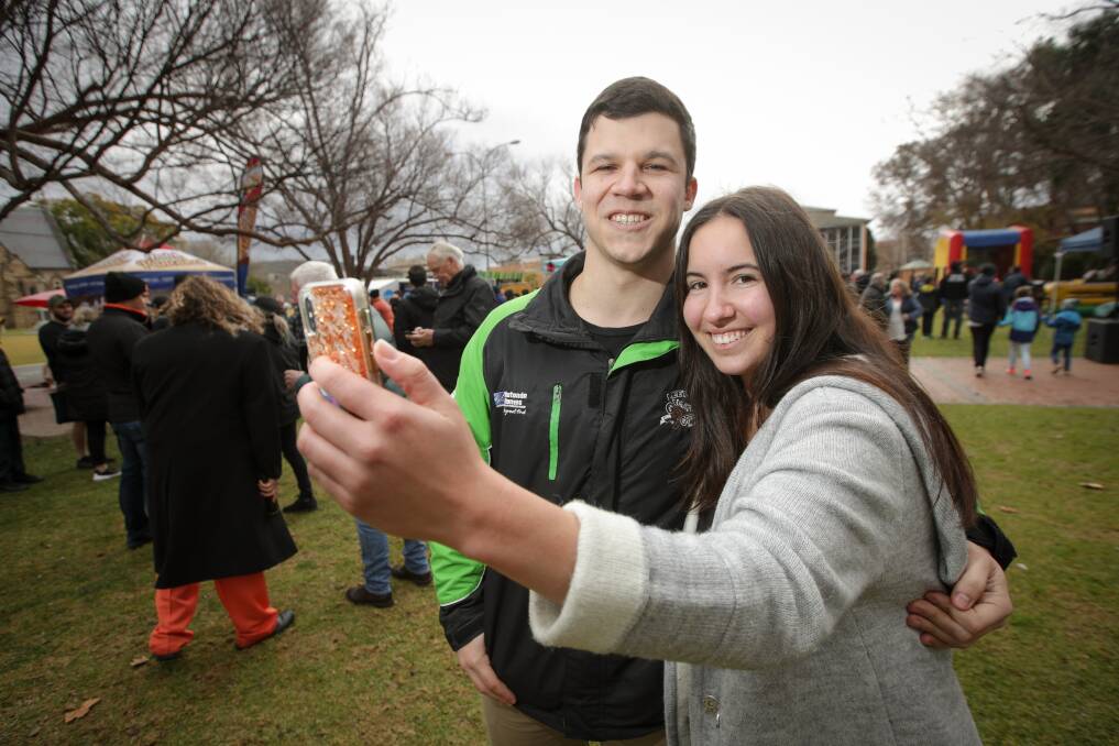 UNEXPECTED BONUS: Thurgoona couple Sam Demarzo and Tara Searl were excited to win a $10,000 land package as part of the augmented reality app's opening. Picture: JAMES WILTSHIRE