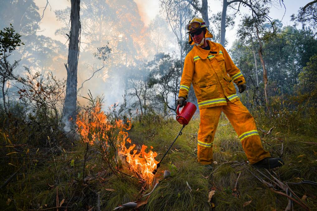 Milder forecast conditions will allow firefighters to strengthen containment lines in Victoria. Picture: JASON EDWARDS