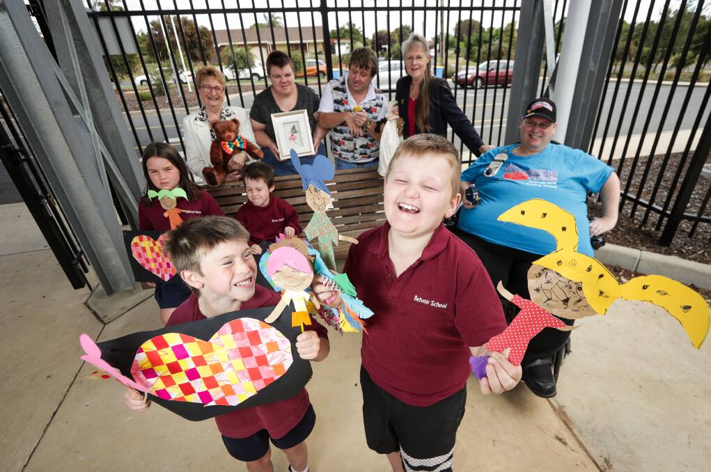 LOTS TO SEE: Belvoir Special School students Rex Christall and Jayden Hodgkin, both 8, with fellow students and participants in this year's Doll, Bear and Hobby Show. Picture: JAMES WILTSHIRE
