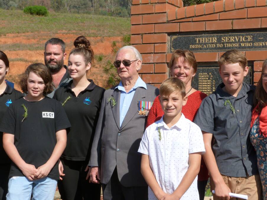FOUR GENERATIONS: William Francis Bouker with his daughter Nola Lord, grandsons and great-grandchildren at the Mitta Valley Anzac service. Picture: SUPPLIED