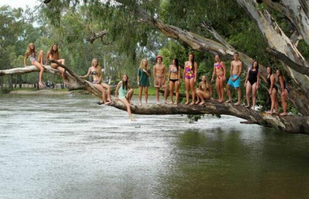 FUN TIMES: The tree that toppled into Noreuil Park has been a favourite for teenagers, as this 2014 photo of Xavier High School year 9 students indicates. Picture: MATTHEW SMITHWICK