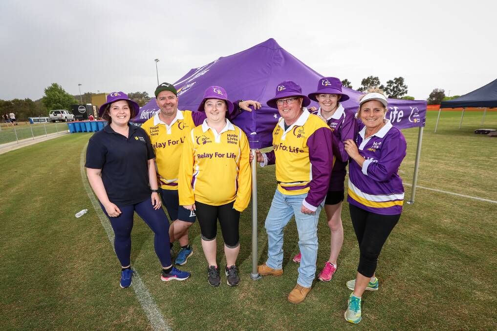 WILLING WORKERS: Setting up at Alexandra Park on Friday are Brianna Carracher, Jeff Ryan, Natasha Butler, Peter Whitmarsh, Rhiannon Grazules and Linda Butler. Picture: JAMES WILTSHIRE