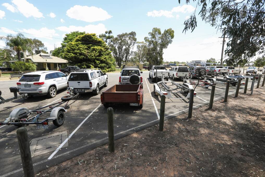 POPULAR PASTIME: A crowded Bundalong boat ramp car park during the summer indicates the interest in boating.