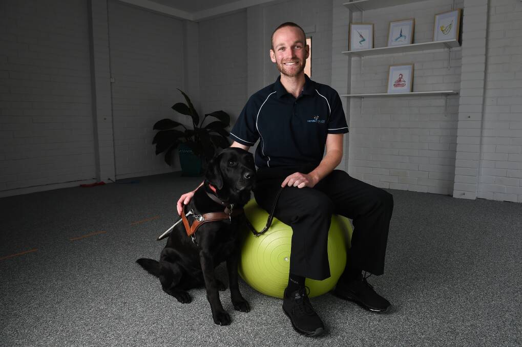 SEEKING TO INSPIRE: Border physiotherapist Dan Searle, pictured with his dog Frodo, will share some of his own experiences during his motivational talk. Picture: MARK JESSER