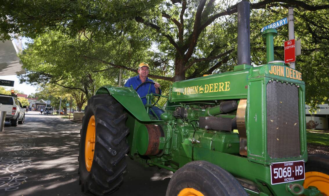 CITY STOP: Wally Shannon parks his John Deere tractor in Albury's QEII Square. Picture: TARA TREWHELLA