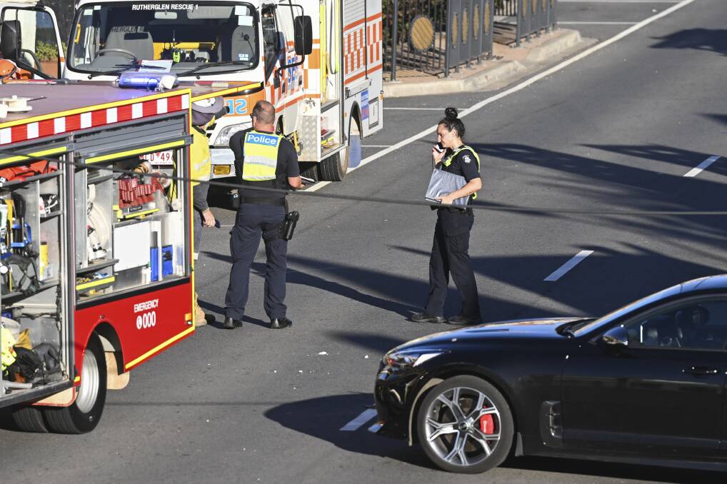 Police deal with the truck crash in Rutherglen on Friday, March 15. One reader describes "trying to avoid becoming roadkill down the Main Street of Rutherglen as trucks navigate their way between parked cars and a narrow street". Picture by Mark Jesser