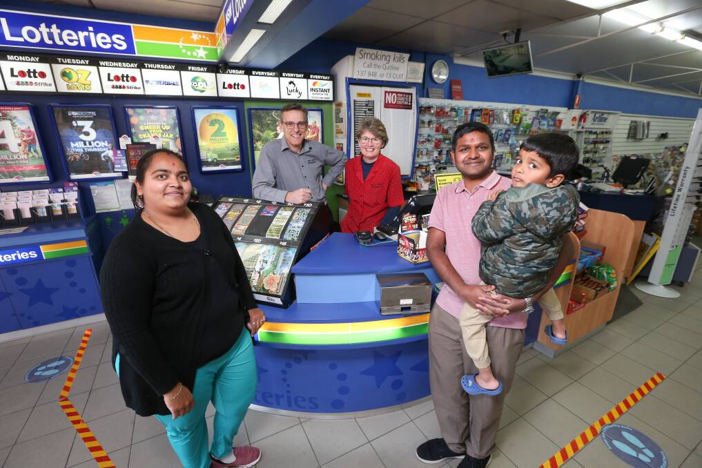 TRANSITION: Bhavna Kerai says Barry and Jane Verbunt will be welcome visitors any time after she and Arvind Bhudiya, with their son Yagnik, 4, take over North Albury Newsagency. Picture: JAMES WILTSHIRE