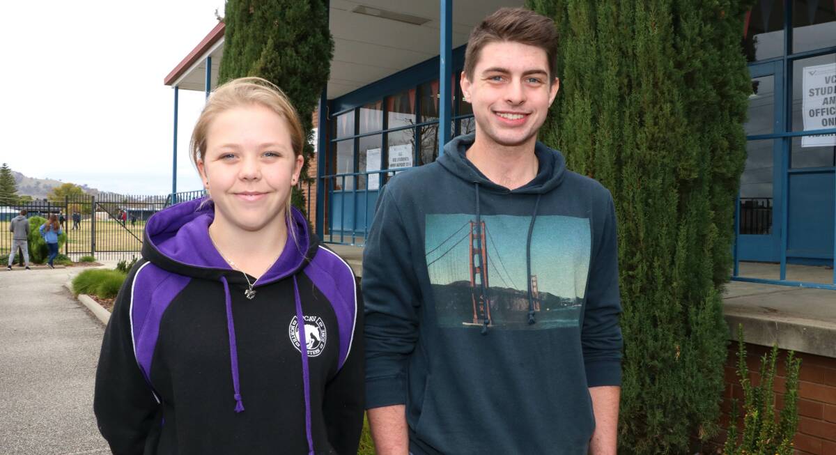 FIRST THOUGHTS: Year 12 students Georgia Don, 18, and Cameron Taylor, 17, say the costs can affect decisions about university courses. Picture: NICHOLAS QUIHAMPTON