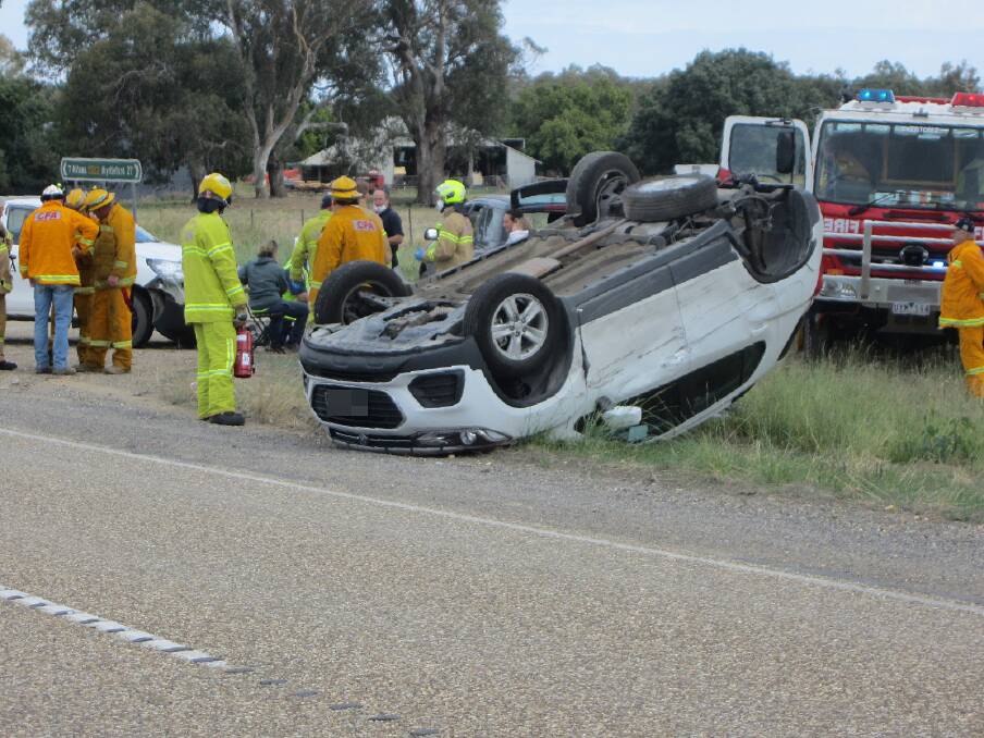 ROLLOVER: Emergency services took more than an hour to clear the scene of a two-vehicle collision on Snow Road at Markwood Wednesday morning. During that time traffic had to be stopped periodically. Picture: VICTORIA POLICE