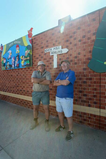 PLYWOOD PIECES: Howlong Men's Shed members Graham Molkentin and Fred Jesshope stand among some of the town decorations. Picture: TARA TREWHELLA