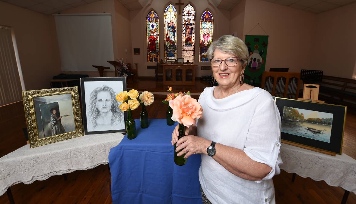 ALL INVITED: Albury's Pam Boswell is one of the artists contributing to Saturday's St David's Church Fair, with everyone welcome to bring their roses. The fair will not include a formal rose show this year. Picture: MARK JESSER