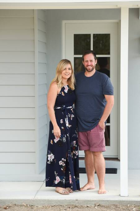 NEW LIFE: Melissa and Aidan Robertson outside their home, which was built by GJ Gardener Homes Wodonga. Picture: MARK JESSER