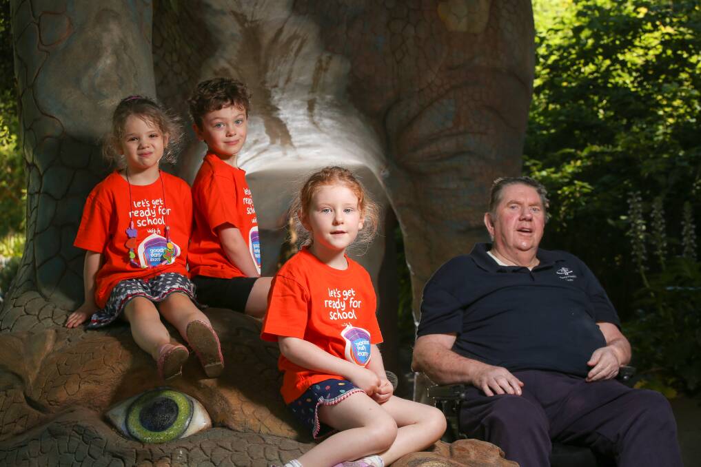 AGES AND STAGES: Goodstart Banff Avenue preschoolers Sarah Smith, Michael Curtis and Holly McElholum, all 5, with Mercy Place's John Smith, 77. Picture: JAMES WILTSHIRE