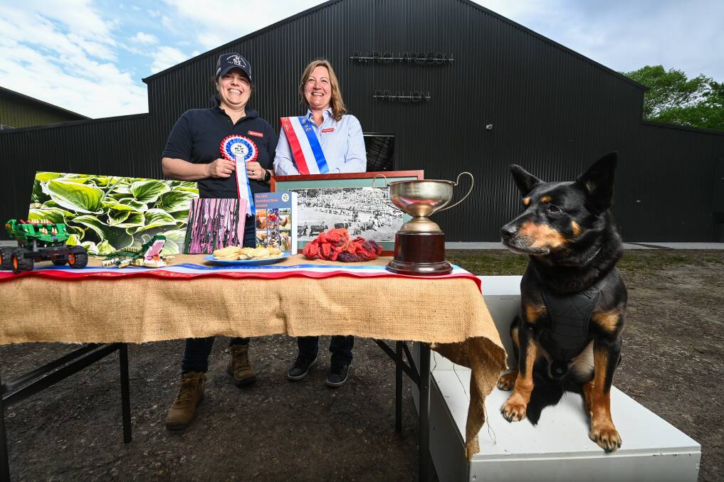 Myrtleford Show secretary Amy Kirk and president Debbie Geddes, with Dude the dog, are excited for a bumper 77th edition of the event on Saturday, October 28. Picture by Mark Jesser