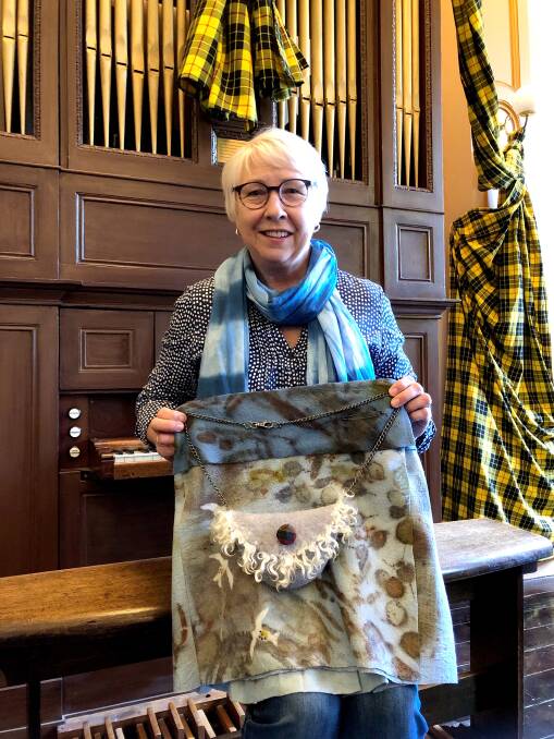 CHALLENGE ACCEPTED: Benalla’s Maggie Hollins with the eco-printed garment she created for Beechworth Arts Council's Elements of Indigo. Picture: JAMIE KRONBORG