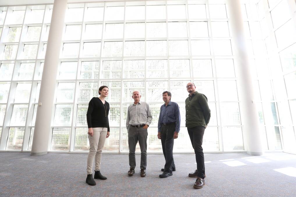 LEGACY: Architects Carly Martin, Kevin Debnam, Rob Simmons and Phillip Nielsen stand in the foyer of West Wodonga's Glasshouse, which is now the home of The Border Mail office. Picture: JAMES WILTSHIRE