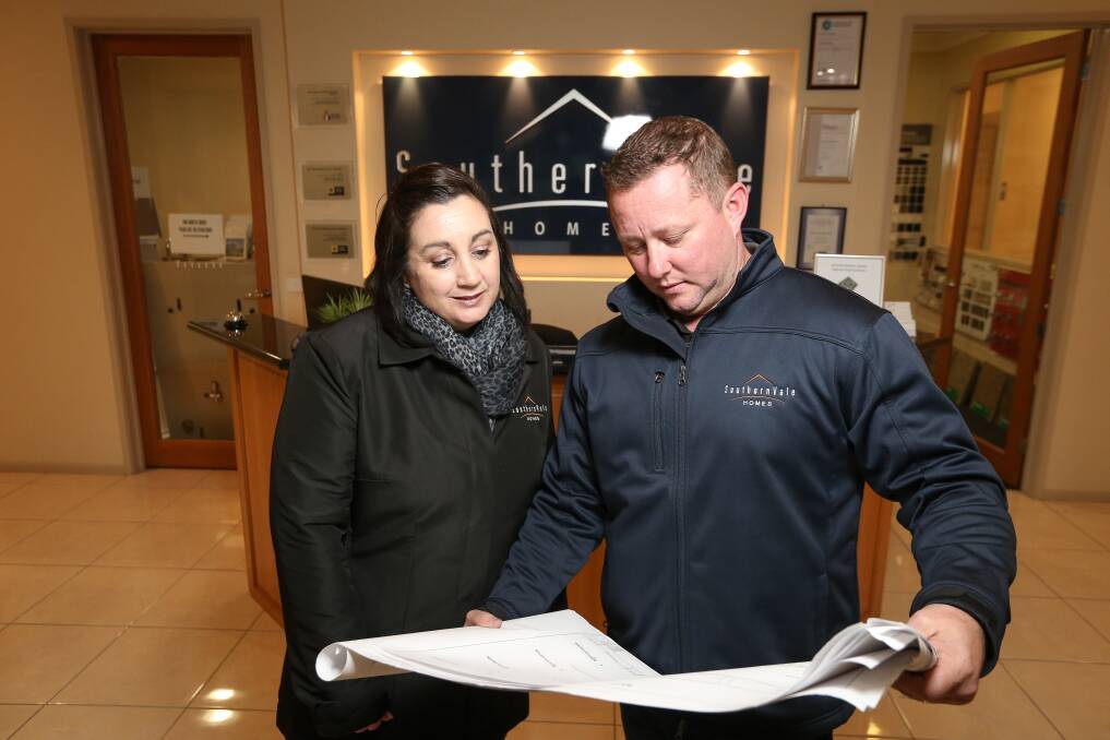 TEAMWORK: Southern Vale Homes director Kylie Stoeckel and general manager John Fisher say the company appreciates the efforts of its staff, subcontractors and suppliers. Picture: JAMES WILTSHIRE