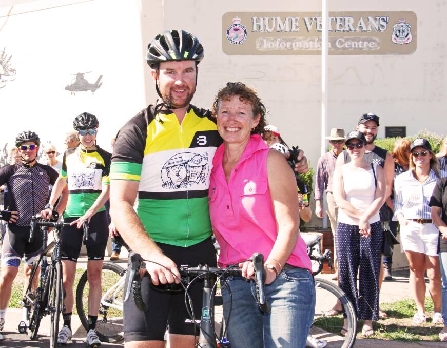 FAMILY SUPPORT: Coo-Wee Ride's Matt Aldridge is congratulated by his mother Chris outside Wodonga's Hume Veterans Information Centre in April. Picture: SALLY HARDING