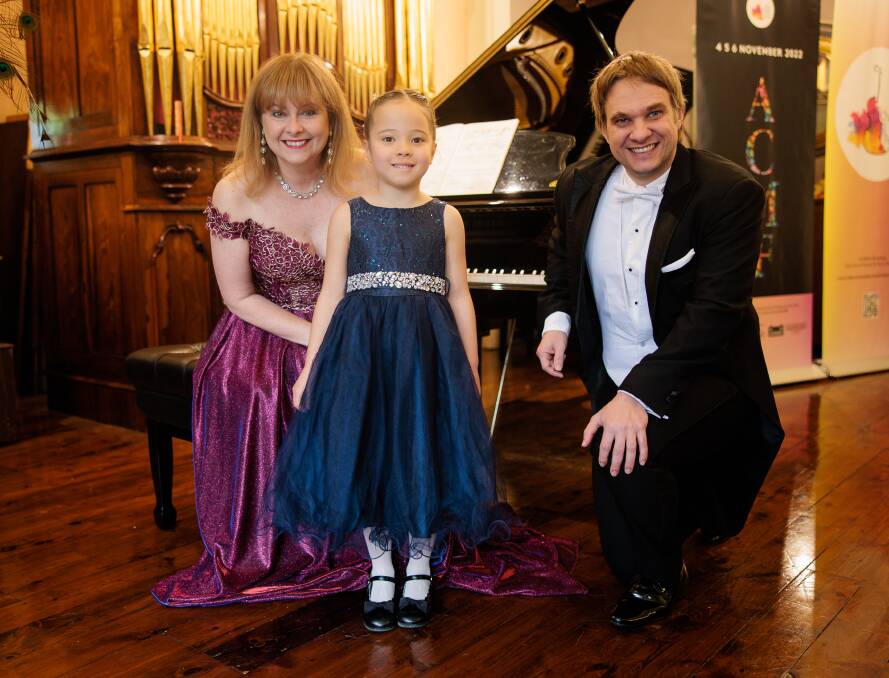 MAGIC OF MUSIC: Albury's Mika Wylie, 6, meets with Albury Chamber Music Festival artistic directors Sally-Anne Russell and Mario Dobernig during the event's Border launch at Adamshurst. Picture: KOSTA CONSTANTINOU