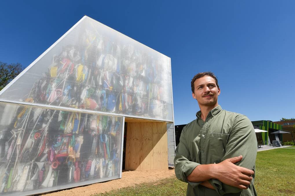 ART AND ARTIST: Architect Raffaello Rosselli outside Plastic Palace, which took about a week to install in central Albury. Picture: MARK JESSER