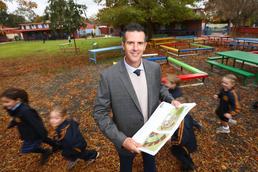 WORKING TOGETHER: St John's Lutheran School principal Brad Moss, pictured last year, has written to parents and staff about the school closure.
